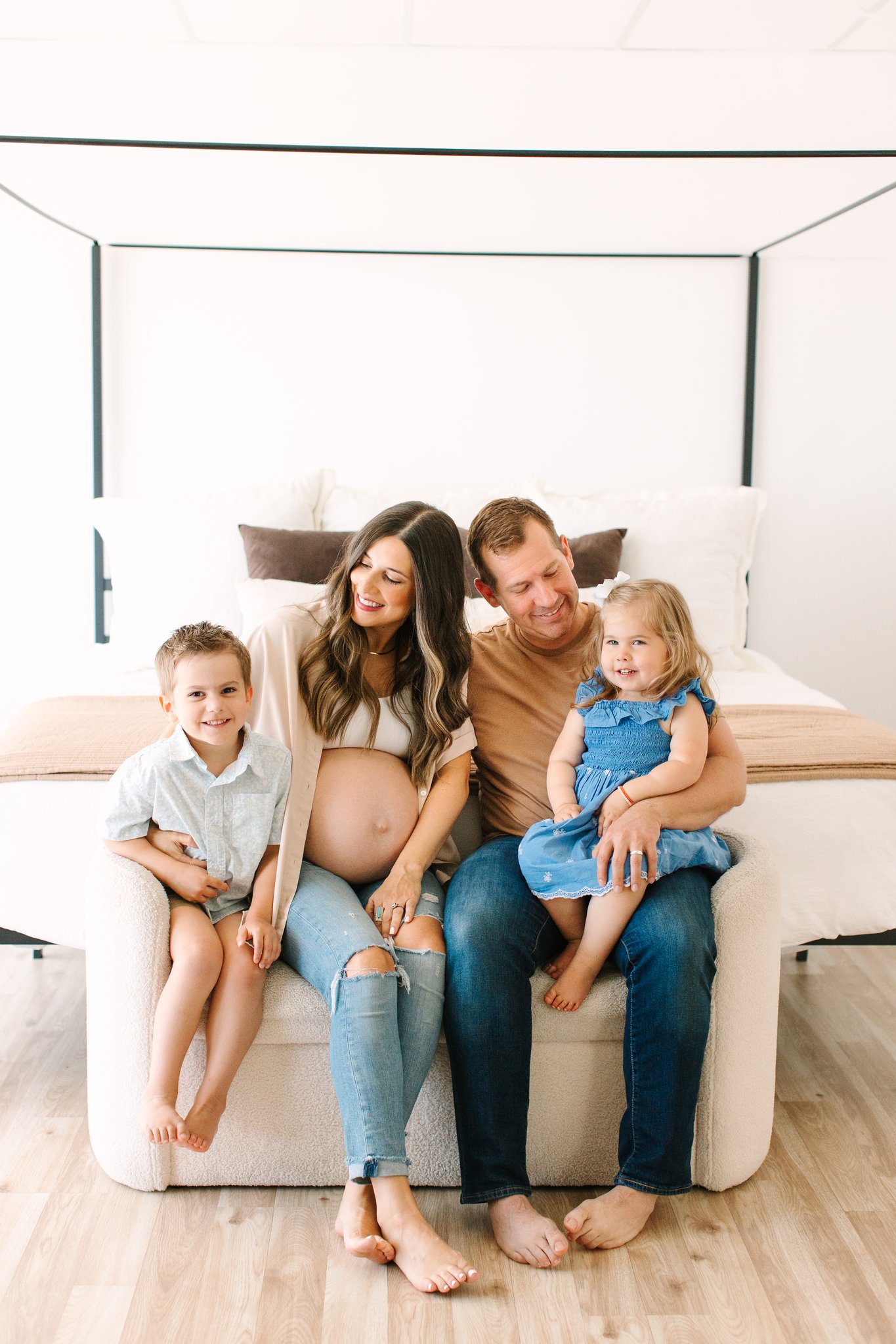 Maternity session with family in natural light studio