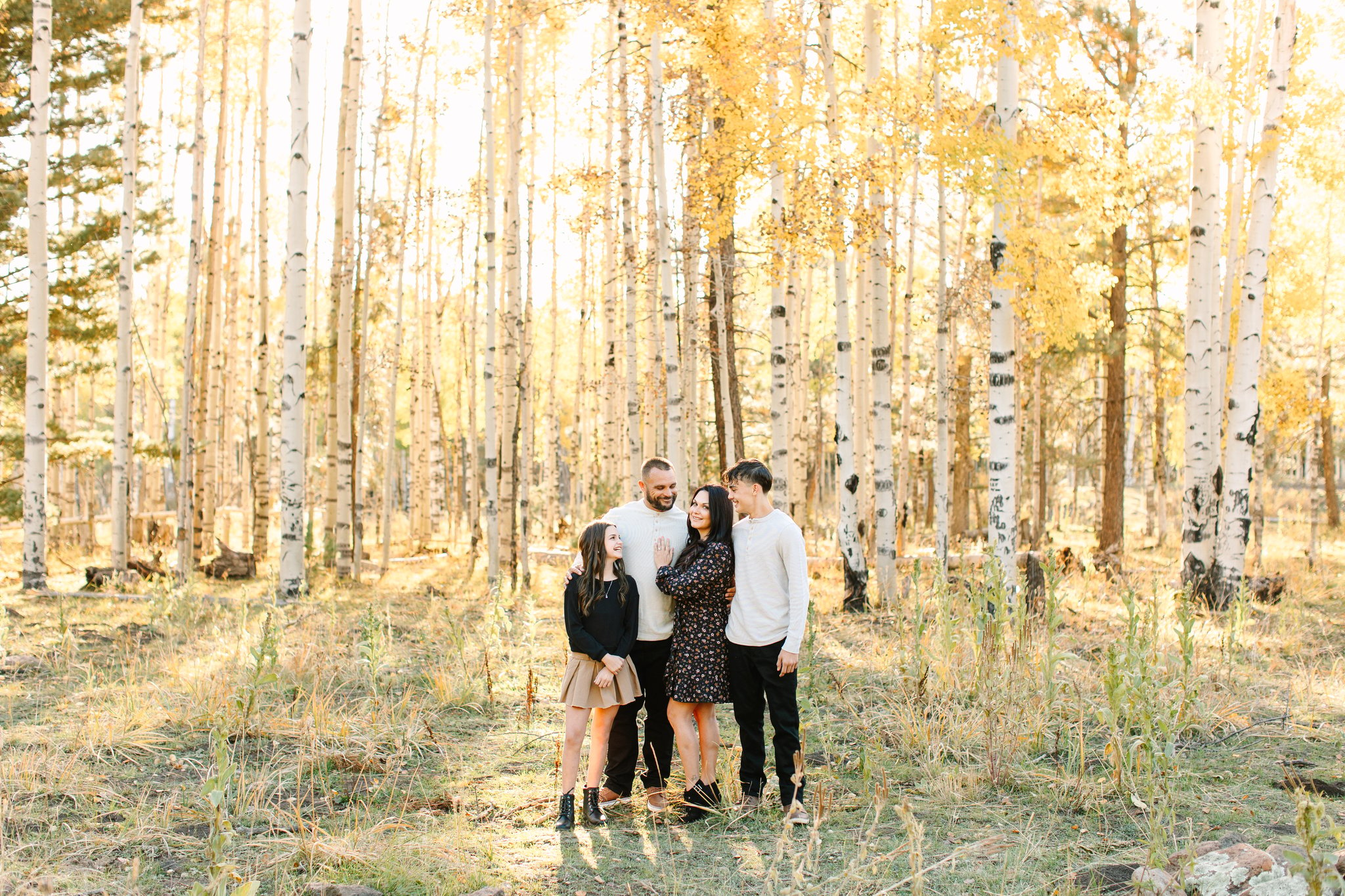 Family of 4 in the golden aspens of Flagstaff, Arizona